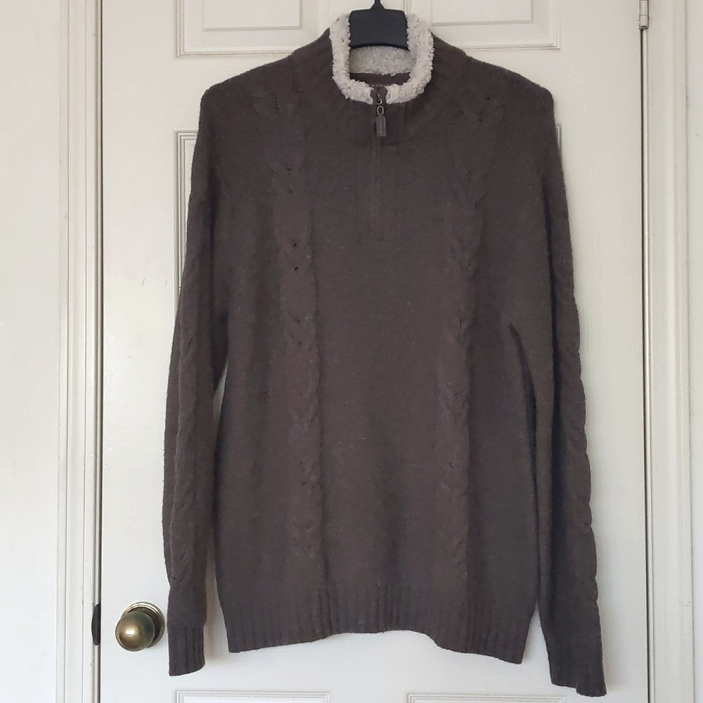 Men's High neck quarter zip up sweater with front and sleeve design.
